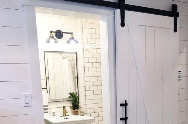 Barn door on a craftsman bathroom